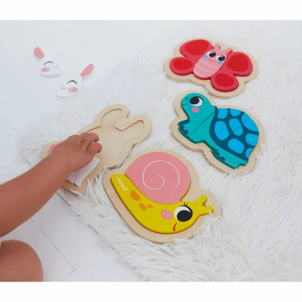 4 puzzles evolutivos de madera · jardín