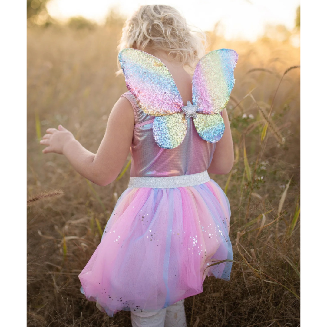Falda de lentejuelas arcoíris con alas y varita
