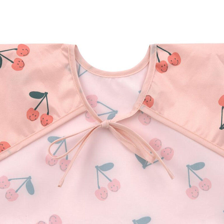 2 baberos manga larga con bolsillo Lässig · fruits cherry
