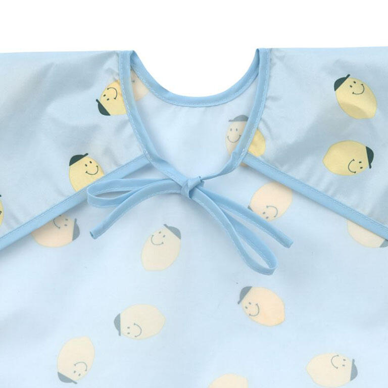 2 baberos manga larga con bolsillo Lässig · fruits lemon