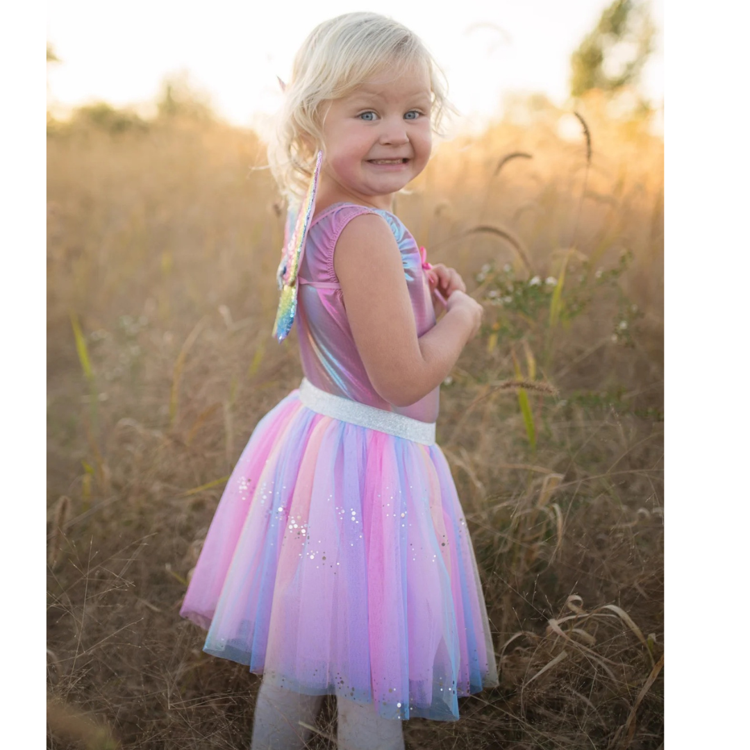 Falda de lentejuelas arcoíris con alas y varita