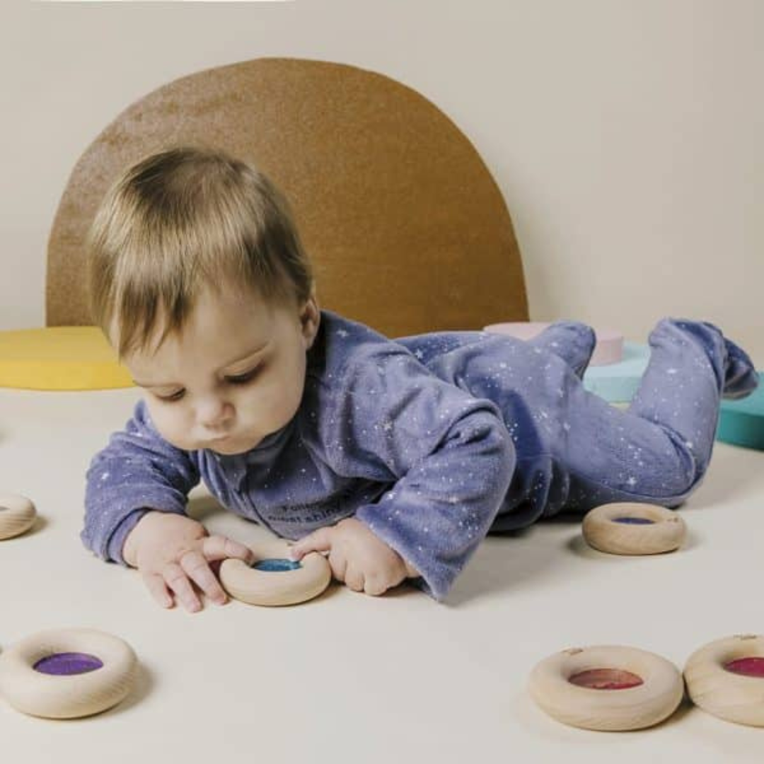 Donut sensorial calma con purpurina