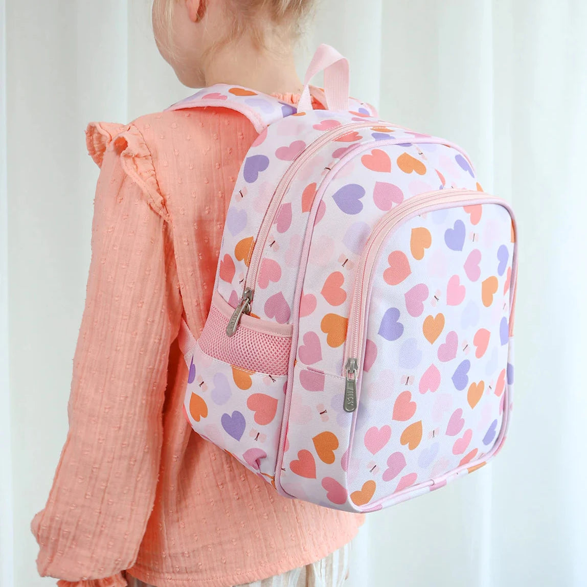 Mochila infantil con bolsillo térmico ALLC · corazones