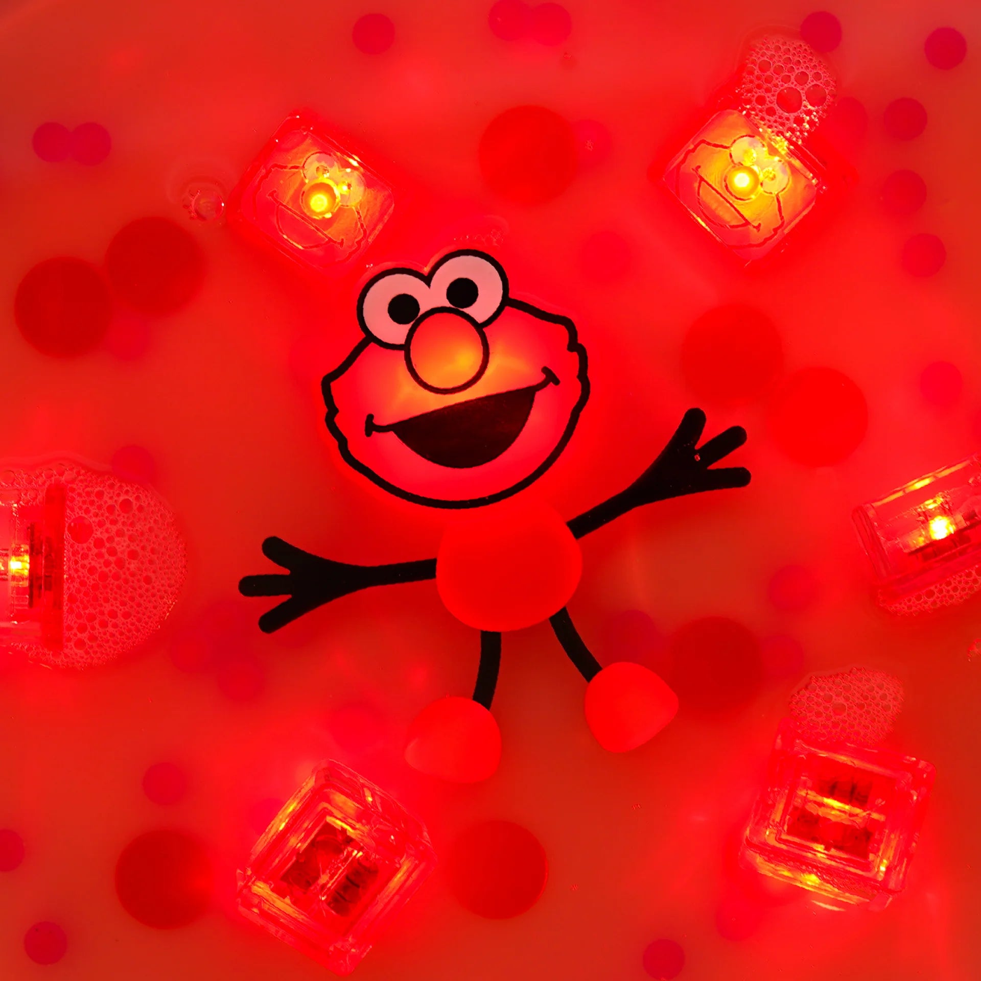 Personaje con 2 cubos de luz GLOPALS · ELMO