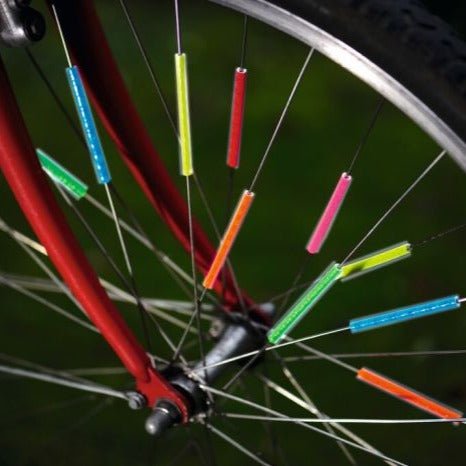 Adornos para radios de bicicleta reflectantes de colores - La Chata Merengüela